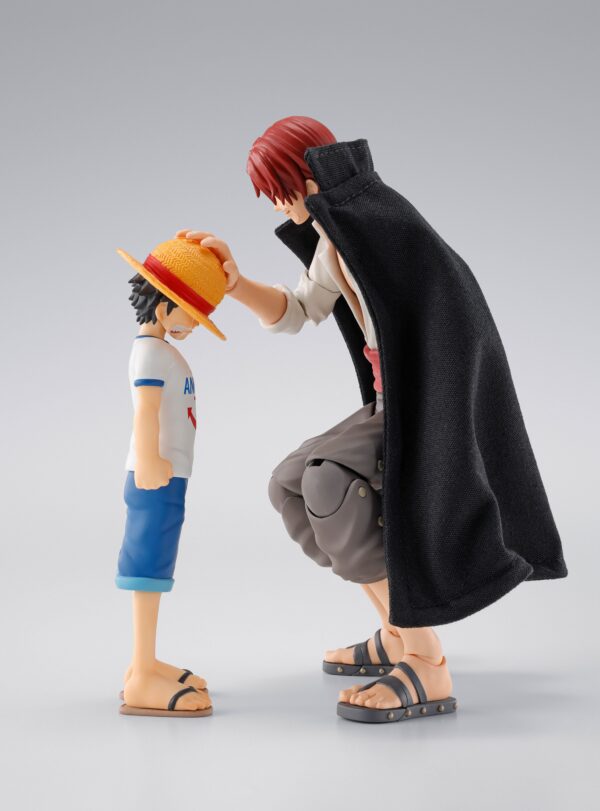 Figuras Shanks & Monkey D. Luffy (Childhood Version) de One Piece S.H. Figuarts, disponibles en Minami Shop. Incluye múltiples accesorios y expresiones intercambiables.