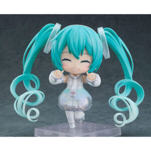 Figura Nendoroid de Hatsune Miku Expo 2021 de 10 cm, mostrando a Miku en su vestimenta del evento con placas faciales intercambiables y accesorios temáticos, disponible en Minami Shop.