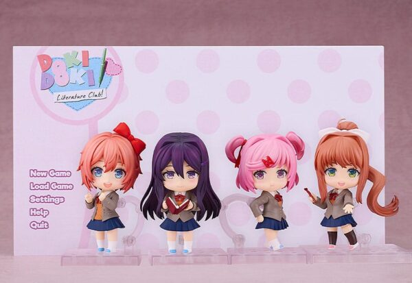 Figura Nendoroid de Yuri de Doki Doki Literature Club de Good Smile Company, con placas faciales y accesorios opcionales como libro y hoja de diálogo.